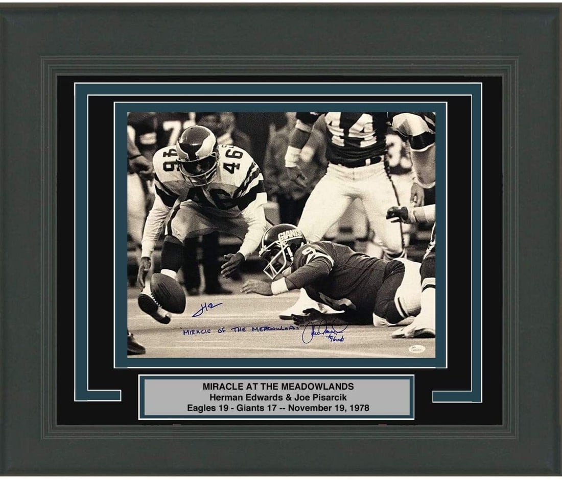 Framed Signed Herm Edwards Joe Pisarcik Miracle at the Meadowlands Photo JSA COA: Framed Signed Herm Edwards Joe Pisarcik Miracle at the Meadowlands Photo JSA COA Celebrate a legendary moment in football history with this professionally framed 16x20 photo featuring the iconic play 