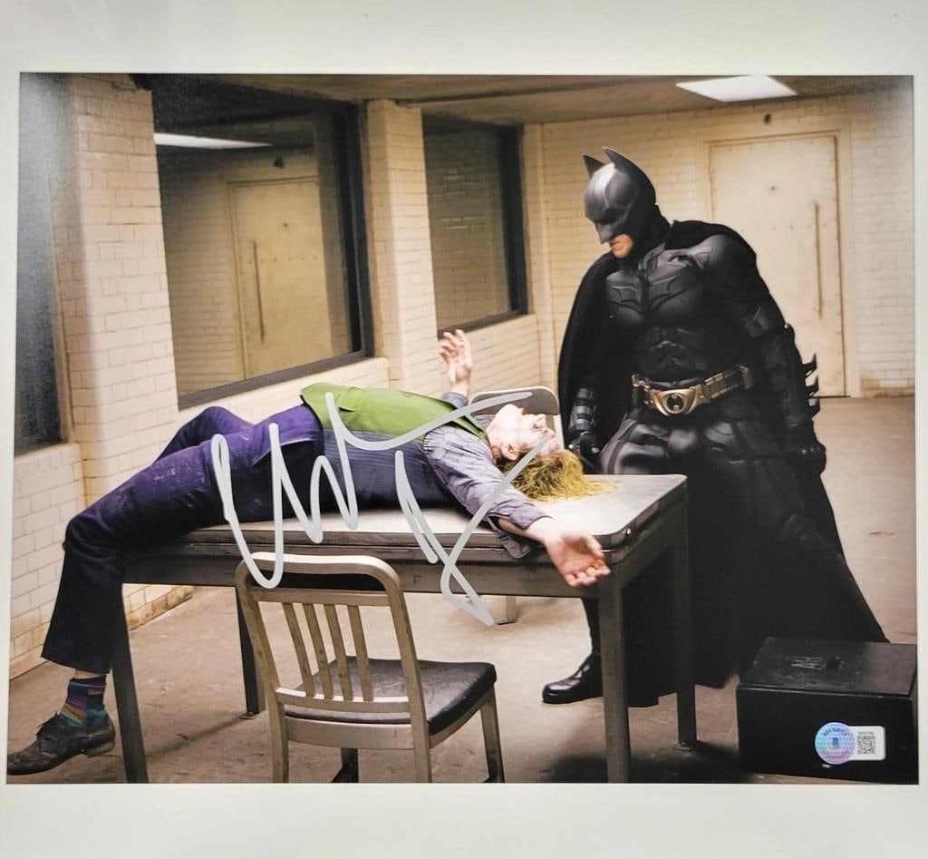 Christian Bale Autographed 11x14 Dark Knight Photo Beckett Authenticated: Christian Bale Autographed 11x14 Dark Knight Photo Beckett Authenticated This original 11x14 photograph features Christian Bale's autograph and captures a memorable moment from the iconic film, The Da