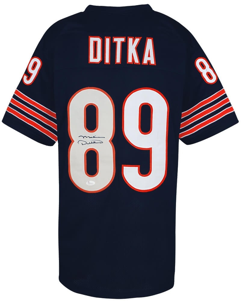 Mike Ditka Signed Chicago Bears Navy Jersey with JSA COA: Mike Ditka Signed Chicago Bears Navy Jersey with JSA COA This is a signed navy custom football jersey of Mike Ditka, a legendary player of the Chicago Bears. The jersey features an authentic