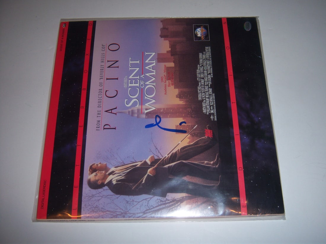 Signed Al Pacino Laserdisc Album Godfather Scent of a Woman: Signed Al Pacino Laserdisc Album Godfather Scent of a Woman This is an original Laserdisc album signed by Al Pacino, renowned for his roles in "The Godfather" and "Scent of a Woman." The album is a