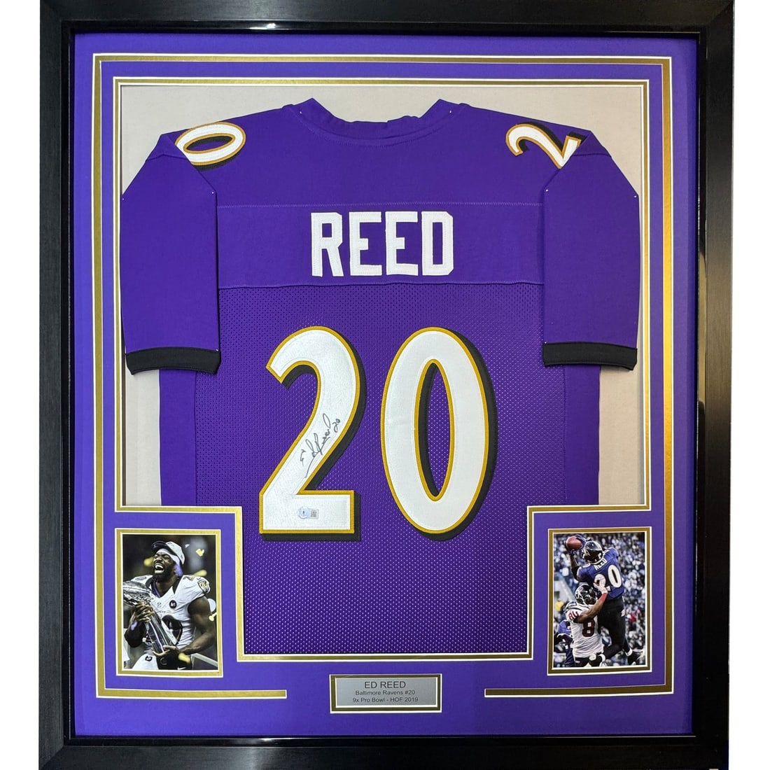 Ed Reed signed framed Baltimore Ravens purple jersey JSA 35x39: Ed Reed signed framed Baltimore Ravens purple jersey JSA 35x39 Professionally framed and matted original signed Ed Reed Baltimore Ravens purple jersey. This pre-owned display includes two 5x7 photos a