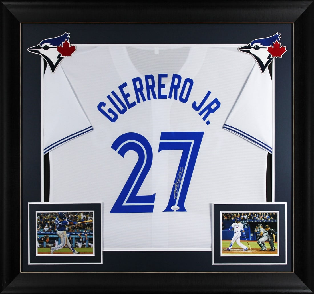Framed Vladimir Guerrero Jr. Signed White Jersey JSA Authenticated: Framed Vladimir Guerrero Jr. Signed White Jersey JSA Authenticated This professionally framed white pro style jersey has been hand-signed by Vladimir Guerrero Jr. of the Toronto Blue Jays. The jersey 