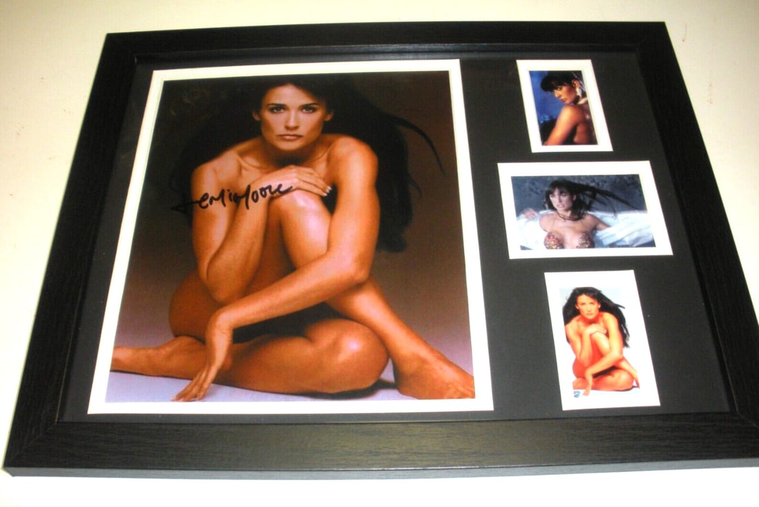 Signed 8x10 Framed Photo of Demi Moore with JSA Authentication: Signed 8x10 Framed Photo of Demi Moore with JSA Authentication This is an original 8x10 photograph of the famous actress Demi Moore, professionally signed and presented in a frame. The photo originate