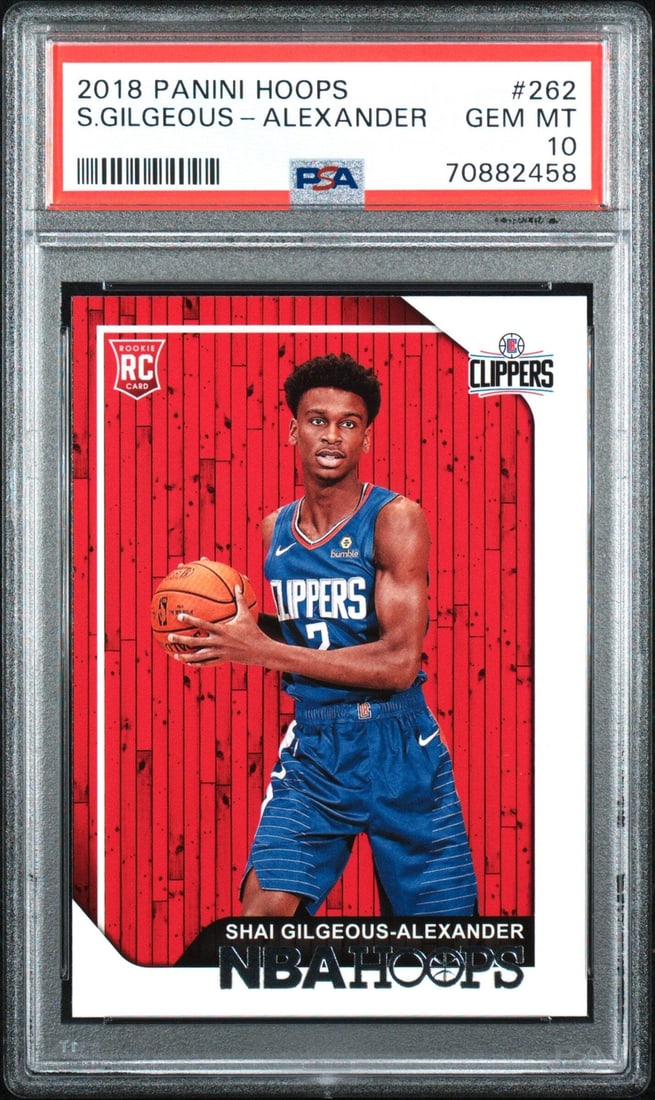 2018 Panini Hoops Shai Gilgeous-Alexander RC PSA 10 Graded Basketball Card: 2018 Panini Hoops Shai Gilgeous-Alexander RC PSA 10 Graded Basketball Card This graded 2018 Panini Hoops Shai Gilgeous-Alexander #262 rookie card is a must-have for any basketball card collector. Auth