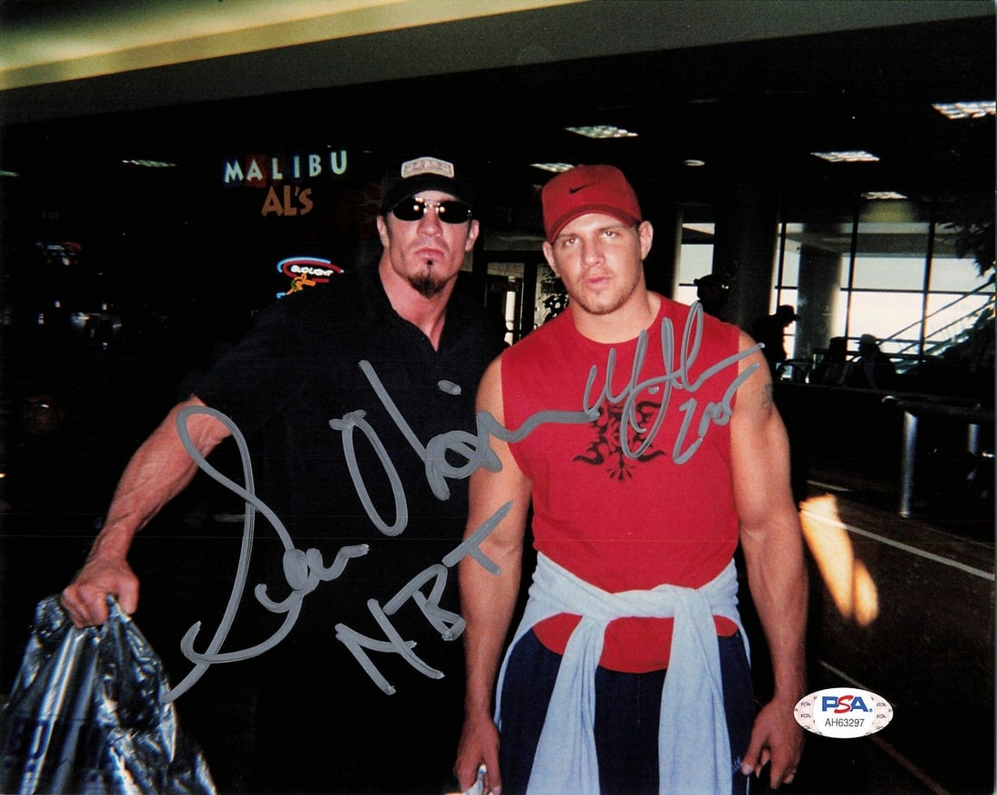 WWE 8x10 Photograph Signed by Sean O'Haire and Mark Jindrak PSA/DNA Authenticated: WWE 8x10 Photograph Signed by Sean O'Haire and Mark Jindrak PSA/DNA Authenticated This is a professionally printed 8x10 photograph featuring the signatures of Sean O'Haire and Mark Jindrak from WWE. T