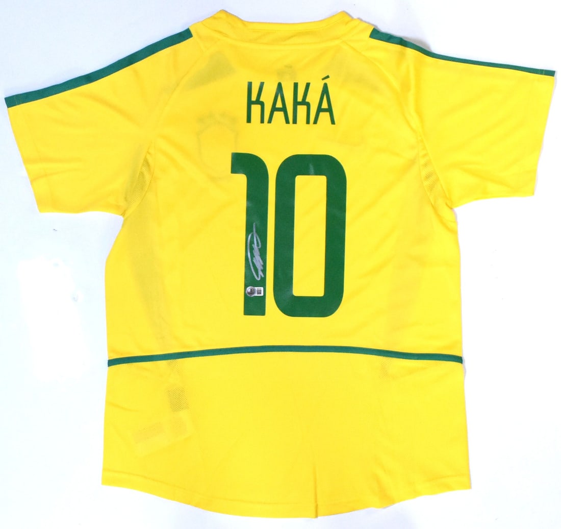 Brazil Home Jersey Signed by Kaka Number 10 Beckett Hologram: Brazil Home Jersey Signed by Kaka Number 10 Beckett Hologram This is a pre-owned Brazil home soccer jersey featuring the number 10, autographed by Kaka. It is an original jersey and comes with Beckett