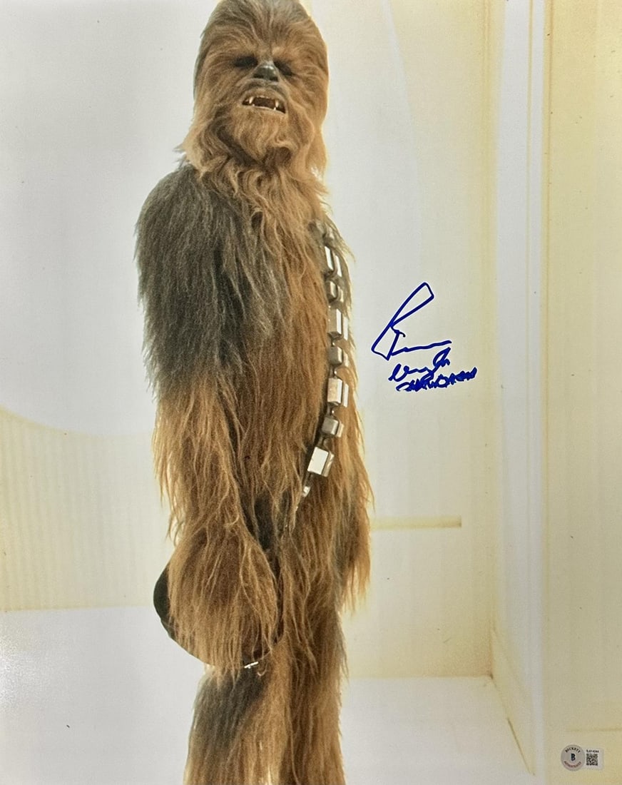 Beckett authenticated 16x20 Chewbacca photo signed by Peter Mayhew: Beckett authenticated 16x20 Chewbacca photo signed by Peter Mayhew Pre-owned 16x20 photograph featuring Chewbacca from Star Wars: The Empire Strikes Back, hand-signed by Peter Mayhew. The photo is ins