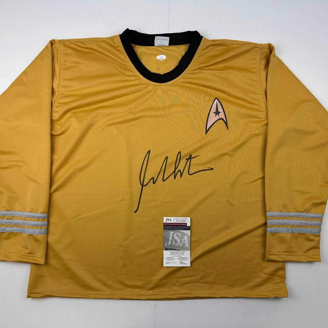 William Shatner Signed Star Trek Captain Kirk Uniform with JSA COA: William Shatner Signed Star Trek Captain Kirk Uniform with JSA COA This is an authentic autographed William Shatner Star Trek Captain Kirk shirt/uniform, featuring a certificate of authenticity from J