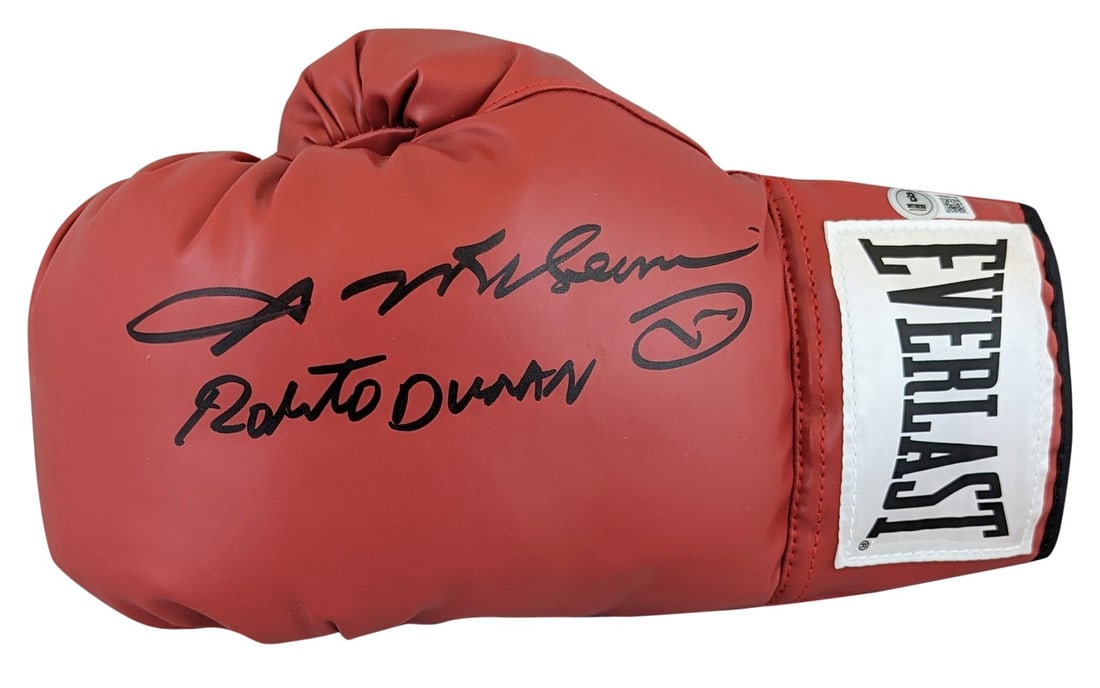 Sugar Ray Leonard Roberto Duran Signed Red Everlast Glove BAS Authenticated: Sugar Ray Leonard Roberto Duran Signed Red Everlast Glove BAS Authenticated This authentic red left hand Everlast boxing glove features the signatures of legendary boxers Sugar Ray Leonard and Roberto