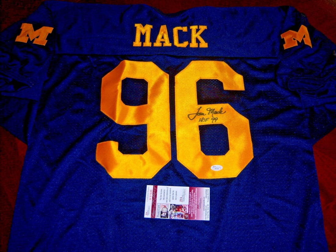 Autographed Tom Mack Jersey with JSA COA Michigan Wolverines Los Angeles Rams: Autographed Tom Mack Jersey with JSA COA Michigan Wolverines Los Angeles Rams This pre-owned jersey features the signature of Tom Mack and represents both the Michigan Wolverines and Los Angeles Rams.