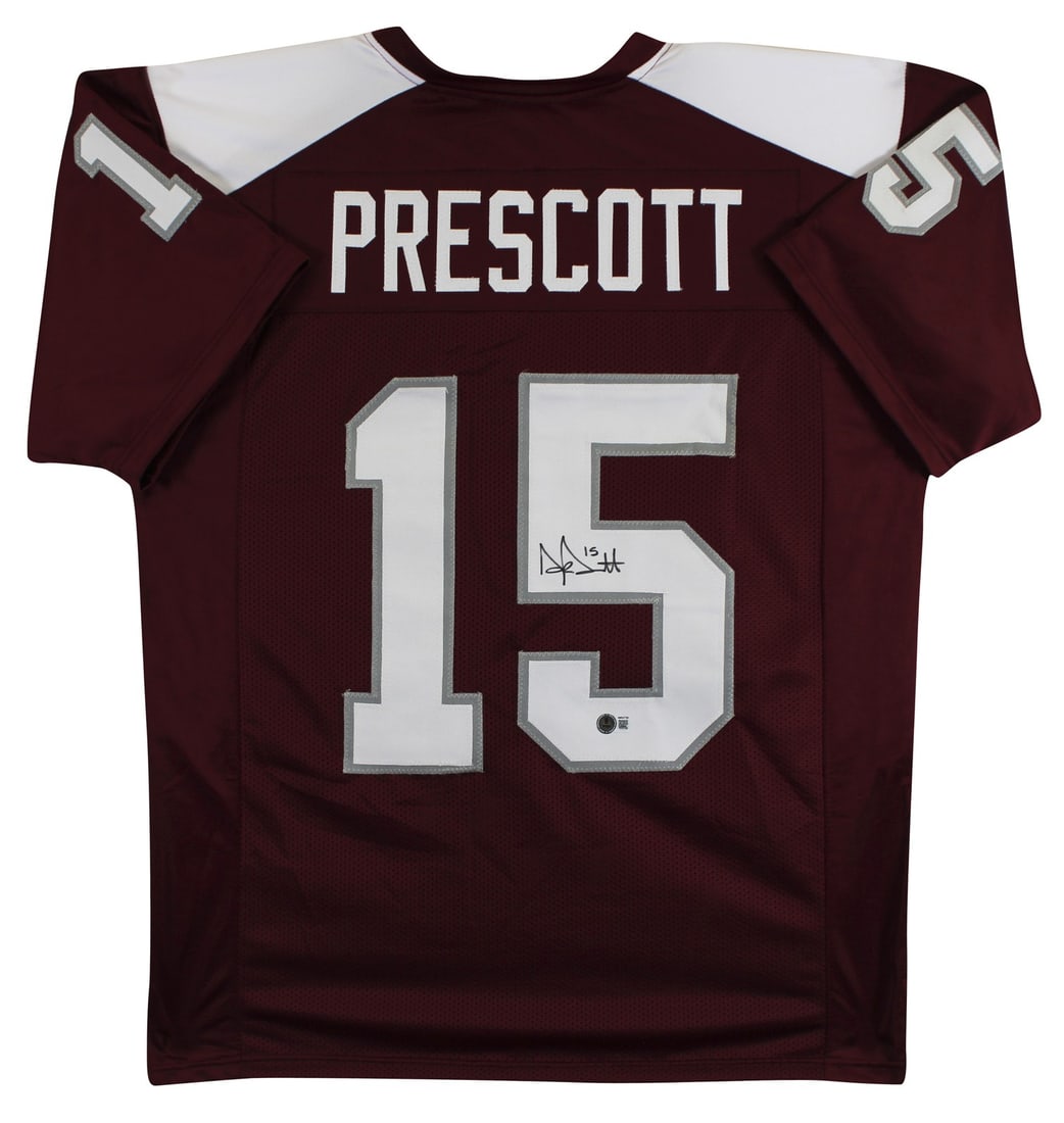 Dak Prescott Mississippi State Bulldogs BAS Witnessed Maroon Jersey: Dak Prescott Mississippi State Bulldogs BAS Witnessed Maroon Jersey This maroon pro style jersey is personally signed by Dak Prescott of the Mississippi State Bulldogs. The autograph was witnessed by 