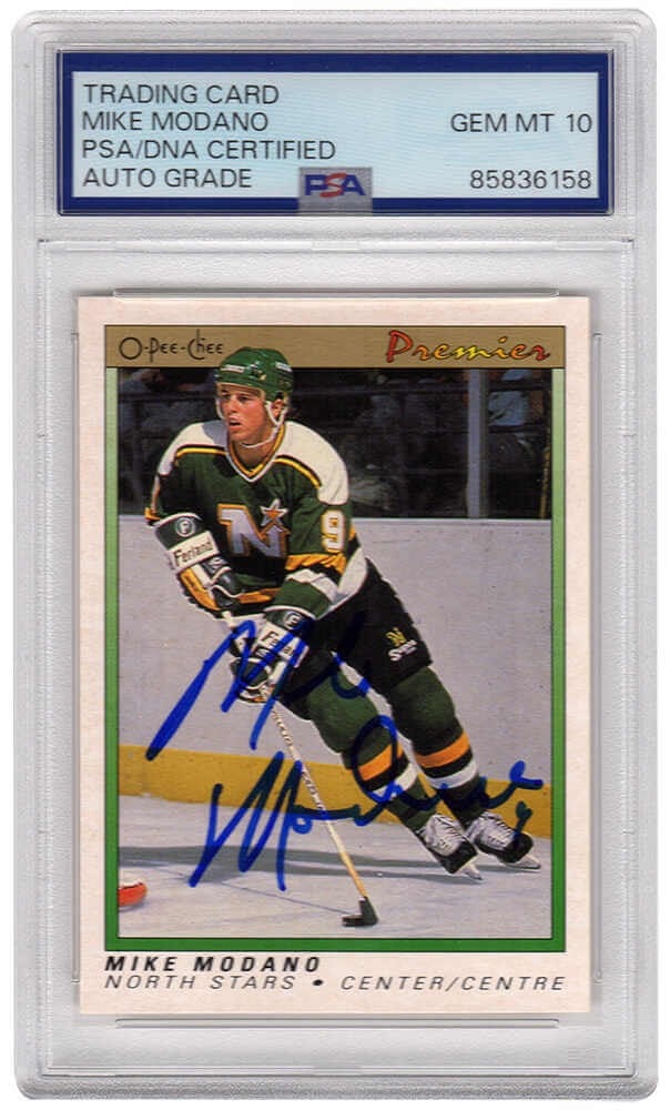 PSA DNA Authenticated Mike Modano 1990-91 O-Pee-Chee Premier Rookie Card 74 Signed: PSA DNA Authenticated Mike Modano 1990-91 O-Pee-Chee Premier Rookie Card 74 Signed Signed Mike Modano 1990-91 O-Pee-Chee Premier rookie card #74 featuring the Minnesota North Stars. The autograph is a