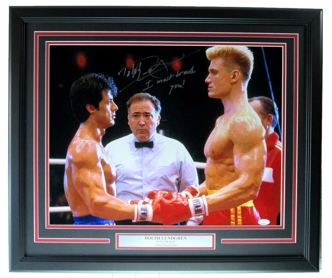 Framed 16x20 Dolph Lundgren Autographed Rocky IV Photo With JSA Authentication: Framed 16x20 Dolph Lundgren Autographed Rocky IV Photo With JSA Authentication This framed 16x20 photograph features Dolph Lundgren's autograph with the inscription "I Must Break You" from the film "R