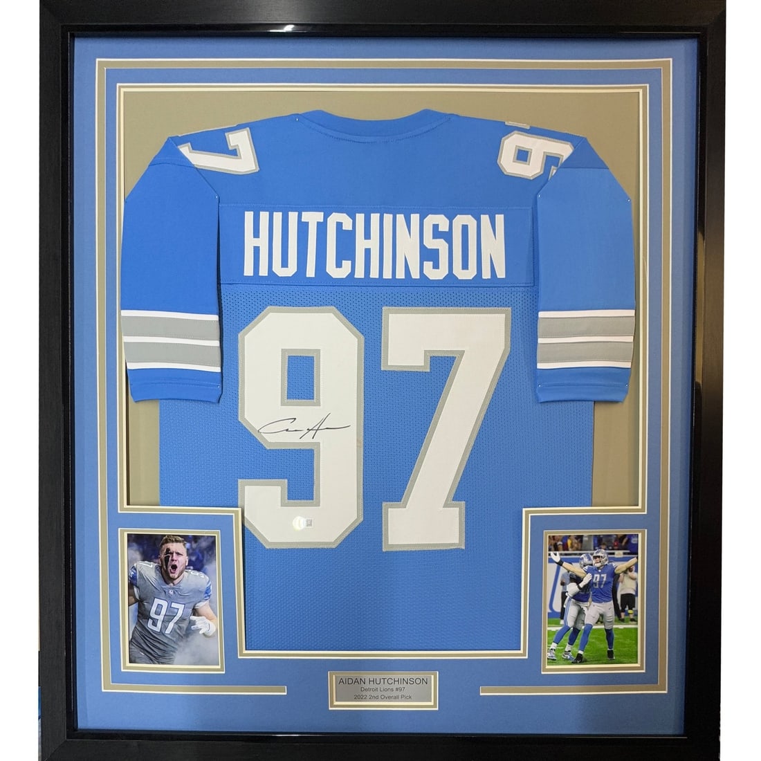 35x39 Framed Aidan Hutchinson Signed Detroit Lions Blue Jersey Beckett COA: 35x39 Framed Aidan Hutchinson Signed Detroit Lions Blue Jersey Beckett COA Professionally framed and matted autographed Detroit blue jersey signed by Aidan Hutchinson. This original signed piece inclu
