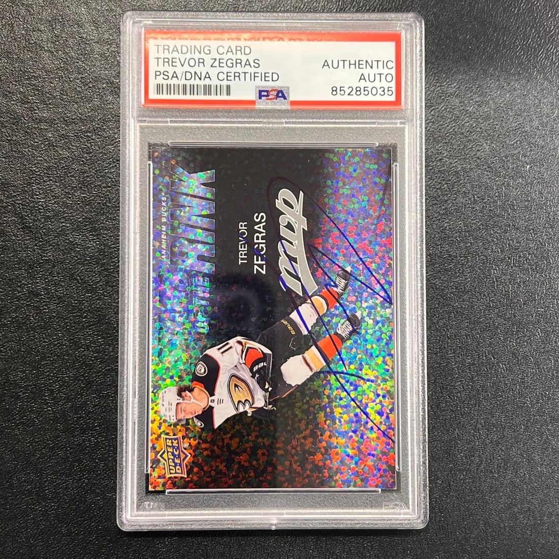2023-24 Upper Deck MVP Hockey Trevor Zegras Signed Card PSA Slabbed: 2023-24 Upper Deck MVP Hockey Trevor Zegras Signed Card PSA Slabbed This is a 2023-24 Upper Deck MVP Hockey #SS-19 trading card, autographed by Trevor Zegras, a standout player for the Anaheim Ducks. 