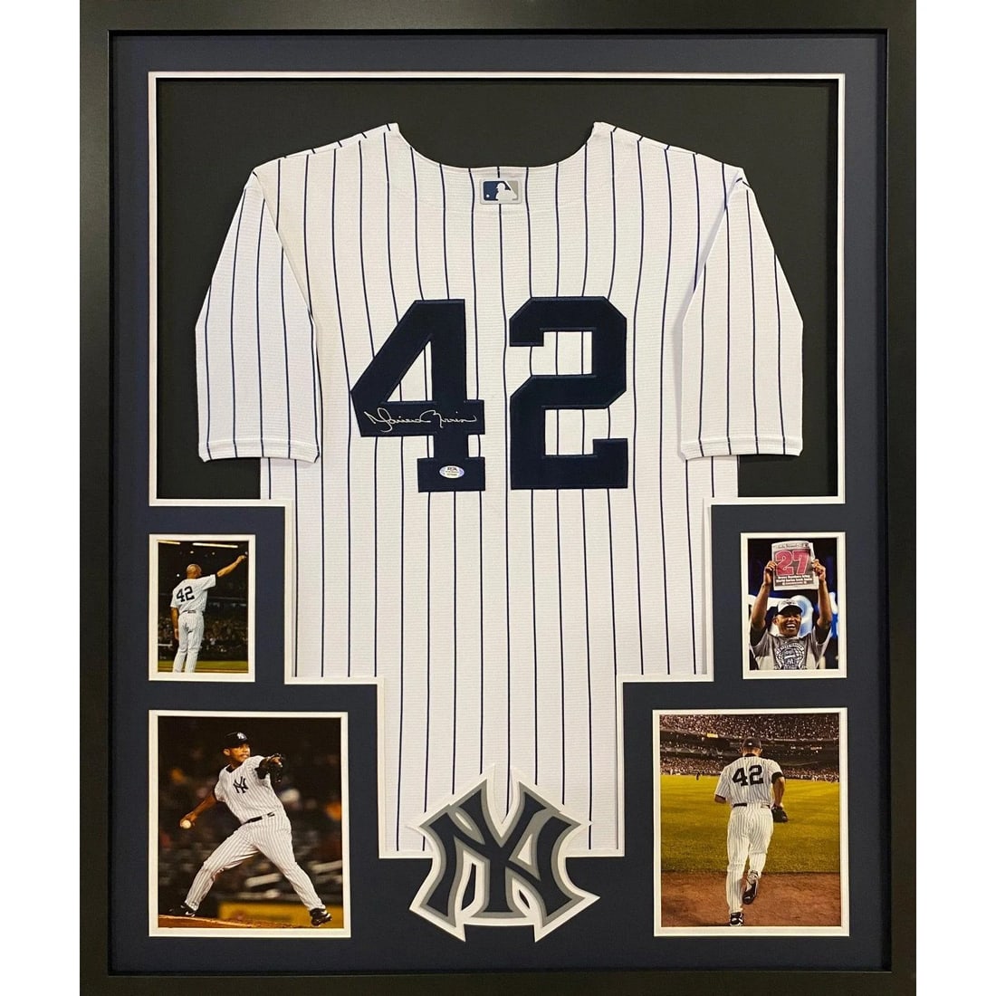 Mariano Rivera Signed Framed Jersey PSA/DNA Authentic Yankees: Mariano Rivera Signed Framed Jersey PSA/DNA Authentic Yankees Celebrate the legacy of Mariano Rivera with this beautifully framed pinstripe jersey. Authenticated by PSA/DNA, a leader in sports memorab