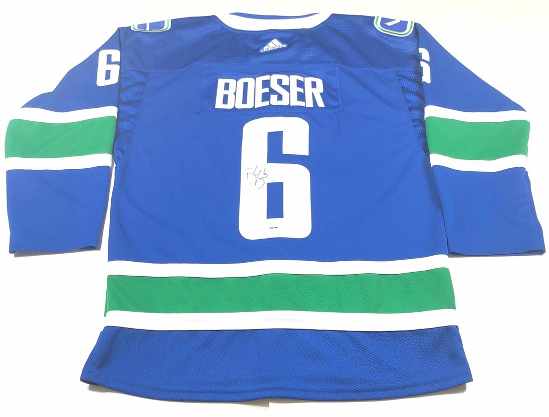 Brock Boeser Autographed Jersey PSA/DNA Vancouver Canucks: Brock Boeser Autographed Jersey PSA/DNA Vancouver Canucks This is an original stitched jersey signed by Brock Boeser, a prominent player for the Vancouver Canucks in the NHL. The jersey features a pro