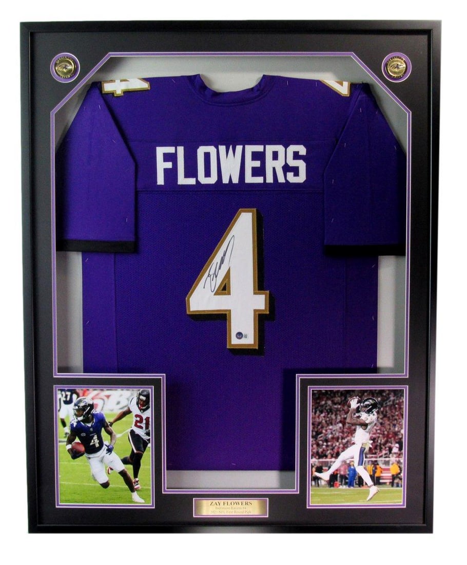 Framed Zay Flowers Ravens purple signed jersey Beckett: Framed Zay Flowers Ravens purple signed jersey Beckett This framed purple football jersey is autographed by Zay Flowers of the Baltimore Ravens. The signature is authenticated by Beckett (BAS), ensuri