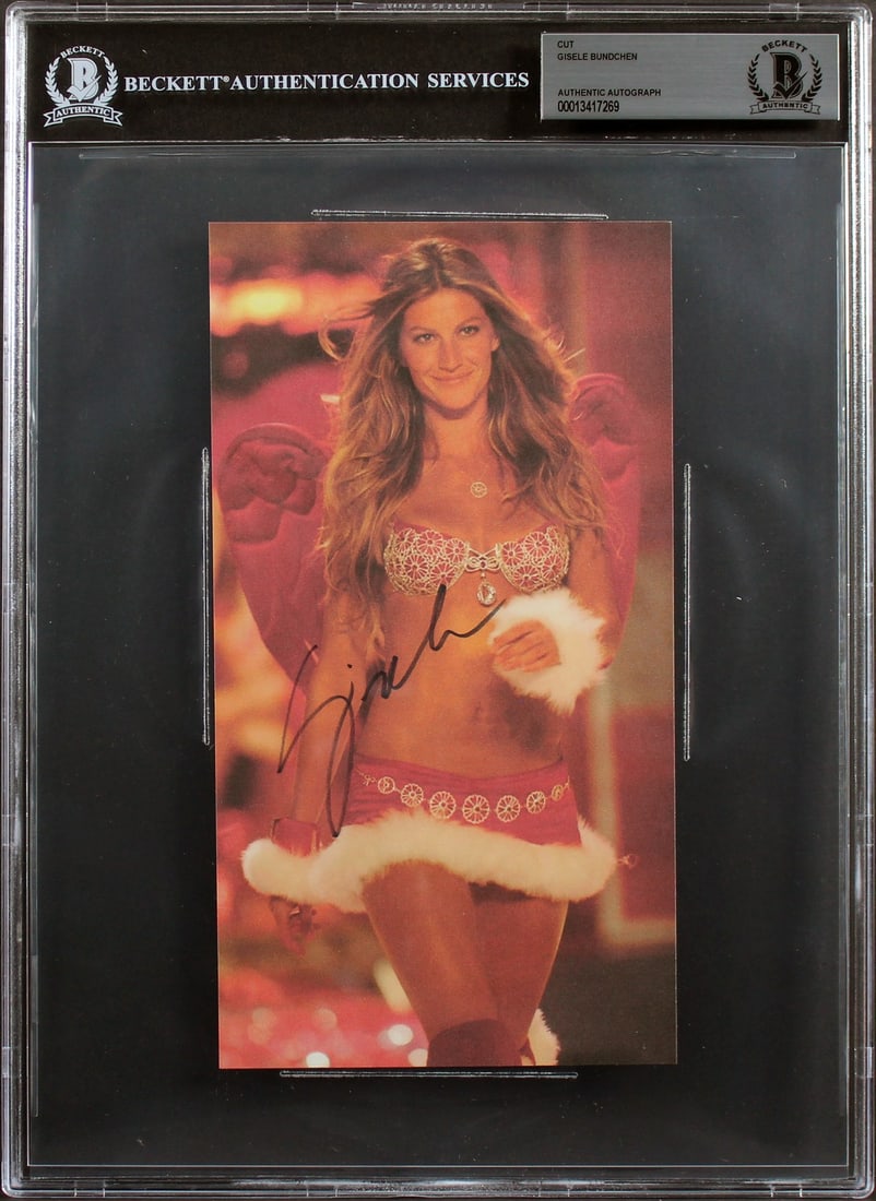 Gisele Bundchen Signed Cut Signature 4.5x8.5 Beckett Authenticated Slab: Gisele Bundchen Signed Cut Signature 4.5x8.5 Beckett Authenticated Slab This 4.5x8.5 cut signature has been personally signed by Gisele Bundchen. The autograph is encapsulated and authenticated by Bec