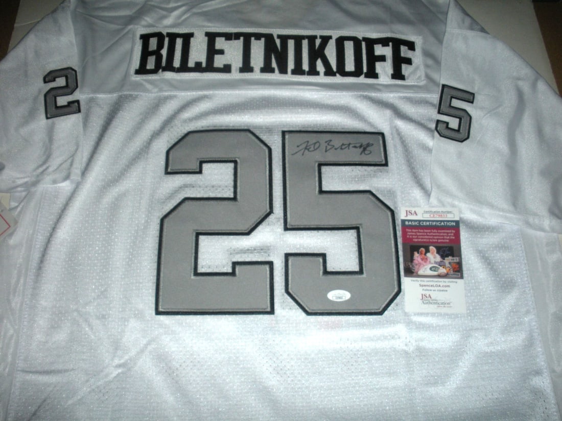 FRED BILETNIKOFF SIGNED RAIDERS MITCHELL & NESS JERSEY JSA/COA: FRED BILETNIKOFF SIGNED RAIDERS MITCHELL & NESS JERSEY JSA/COA This is a pre-owned official licensed Mitchell & Ness jersey, featuring the signature of Fred Biletnikoff, a legendary player in NFL foot