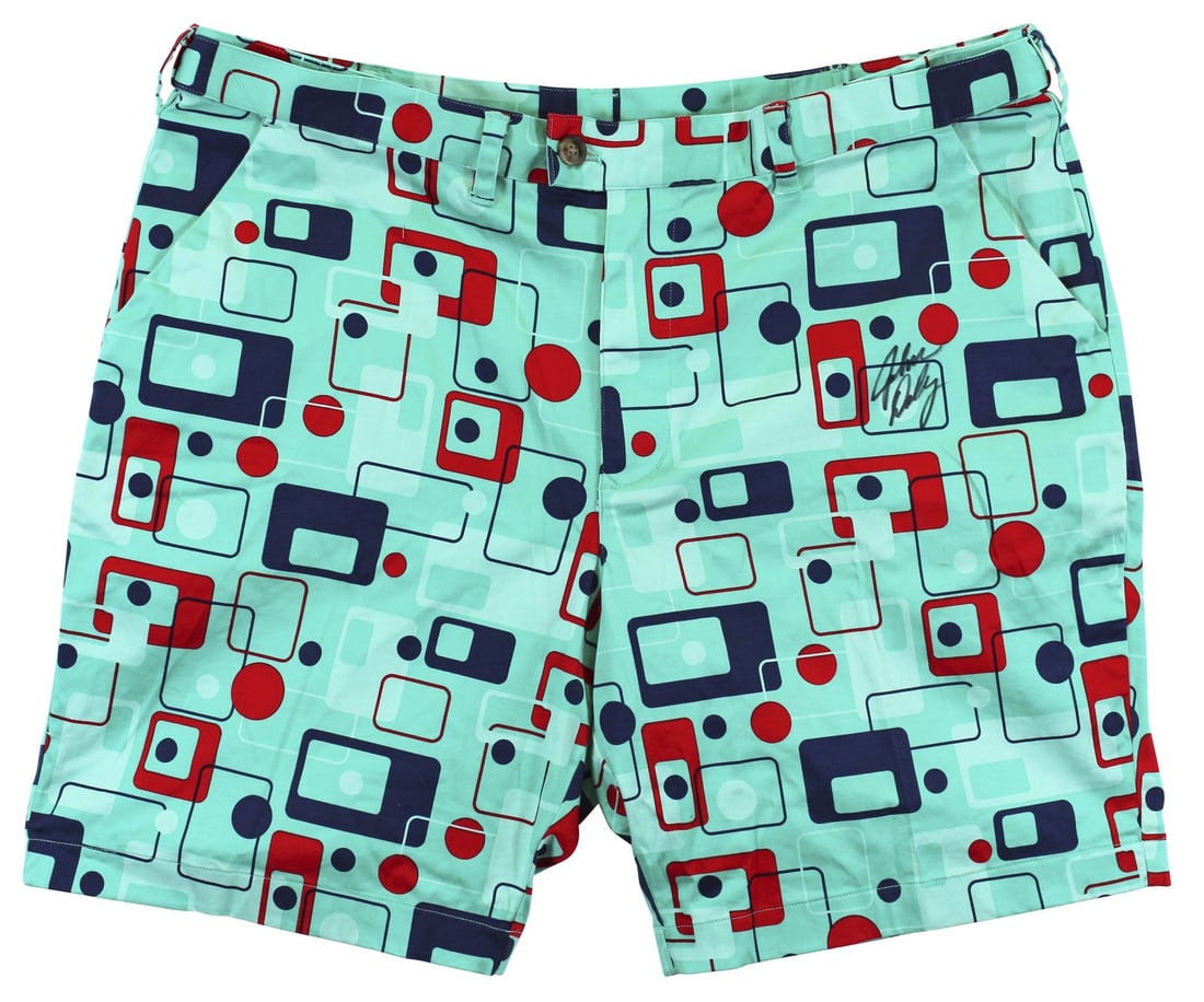 John Daly Signed Teal Loudmouth Golf Shorts Match Worn Beckett Authenticated: John Daly Signed Teal Loudmouth Golf Shorts Match Worn Beckett Authenticated These match worn teal Loudmouth Golf shorts have been personally signed by John Daly. The shorts are authenticated by Becke