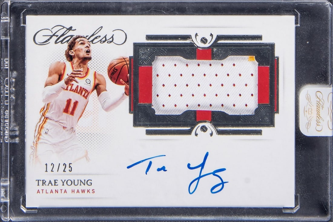 2020-21 Panini Flawless Trae Young Autographed Patch Card #12/25: 2020-21 Panini Flawless Trae Young Autographed Patch Card #12/25 This exquisite 2020-21 Panini Flawless Trae Young Signed Auto Patch card is a must-have for any basketball enthusiast. The collectible 