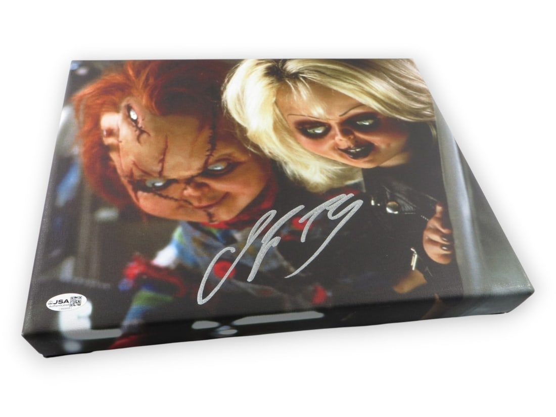 Bride of Chucky 11X14 Canvas Photo Signed by Jennifer Tilly JSA: Bride of Chucky 11X14 Canvas Photo Signed by Jennifer Tilly JSA Pre-owned original Bride of Chucky canvas photograph signed by Jennifer Tilly. The piece is mounted on a wood frame and is ready for han