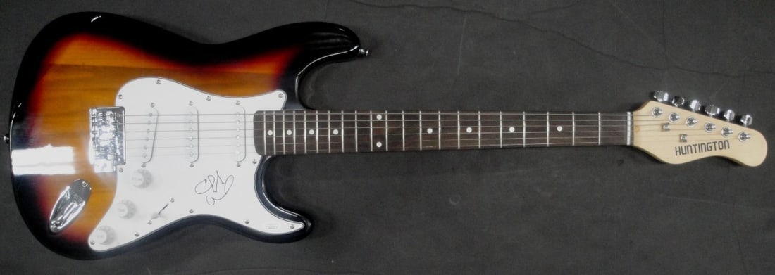 Electric Guitar Hand Signed by Chuck Wicks with JSA Authentication: Electric Guitar Hand Signed by Chuck Wicks with JSA Authentication This electric guitar is autographed by country music star Chuck Wicks. The item is authenticated by James Spence Authentication (JSA)