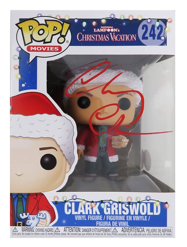 Chevy Chase Autographed Clark Griswold Funko Pop #242 with COA: Chevy Chase Autographed Clark Griswold Funko Pop #242 with COA Celebrate the holiday season with this exclusive Chevy Chase signed Christmas Vacation Clark Griswold Funko Pop Doll #242. This original 