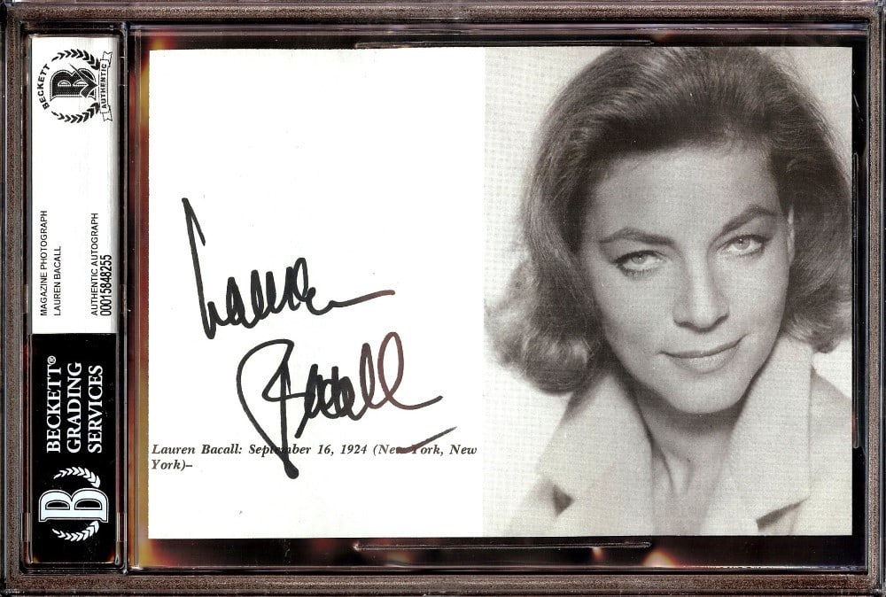 Lauren Bacall Autographed Magazine Photograph Beckett Authenticated 6 x 9: Lauren Bacall Autographed Magazine Photograph Beckett Authenticated 6 x 9 This is an original magazine photograph autographed by legendary actress Lauren Bacall. The signed photo comes from the United