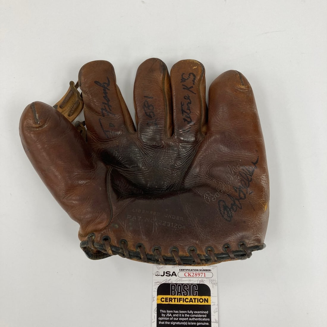 Signed 1940s Game Model Baseball Glove Bob Feller JSA COA: Signed 1940s Game Model Baseball Glove Bob Feller JSA COA Original Bob Feller signed 1940s game model baseball glove. The title notes "2,581 Strikeouts," and the item comes with a JSA certificate of a