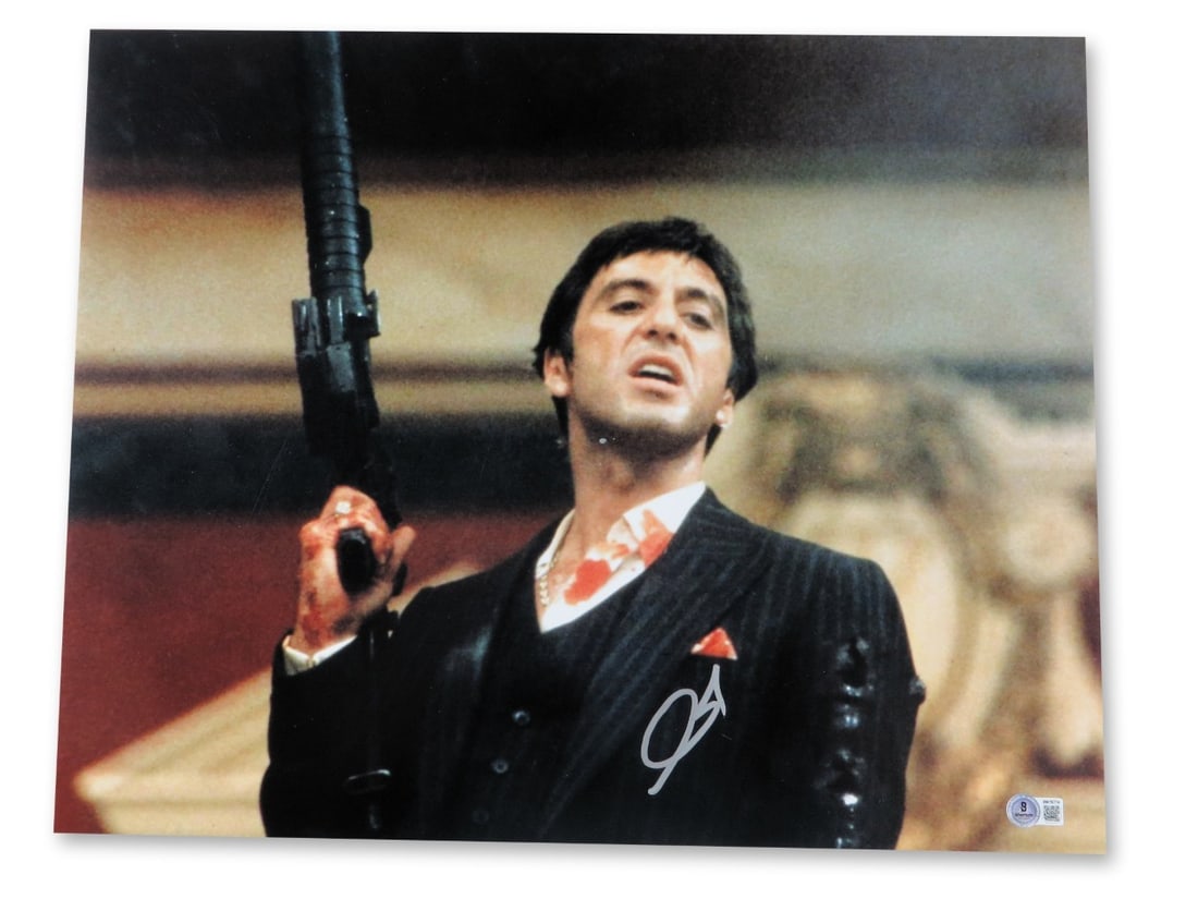 16X20 Scarface Photo Signed by Al Pacino Beckett Authenticated: 16X20 Scarface Photo Signed by Al Pacino Beckett Authenticated Original signed 16x20 photograph featuring Al Pacino in Scarface holding a gun. The autograph has been authenticated by Beckett Authentic