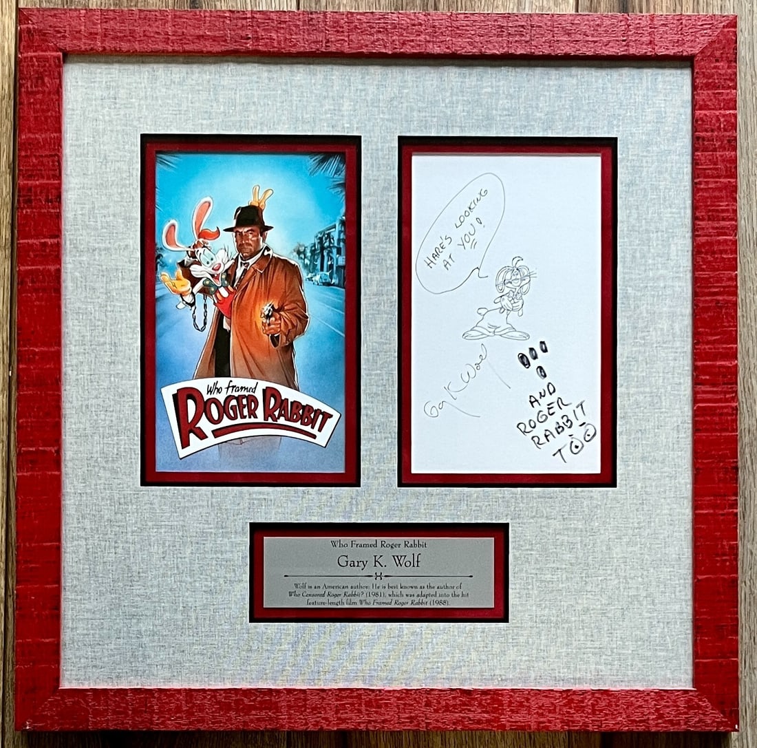 Gary K Wolf Signed Custom Framed Display Who Framed Roger Rabbit 18x18: Gary K Wolf Signed Custom Framed Display Who Framed Roger Rabbit 18x18 This stunning custom framed display features a signed boom page by Gary K Wolf, the creator of Roger Rabbit. The display celebrat