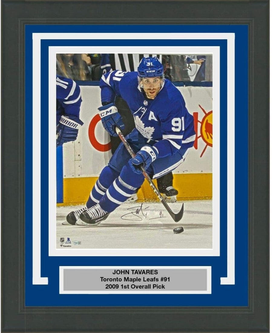 Framed Autographed John Tavares 16x20 Maple Leafs Photo with Fanatics COA: Framed Autographed John Tavares 16x20 Maple Leafs Photo with Fanatics COA Showcase your love for hockey with this professionally framed 16x20 photo of John Tavares, the star player of the Toronto Mapl
