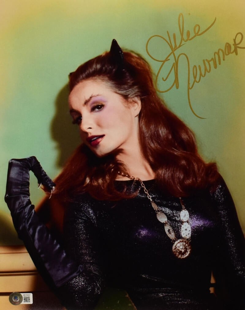 Beckett Certified Julie Newmar Catwoman 11x14 Signed Photo: Beckett Certified Julie Newmar Catwoman 11x14 Signed Photo This is an 11x14 photograph featuring a close-up of Catwoman, autographed by Julie Newmar. The signature is authenticated by Beckett and incl