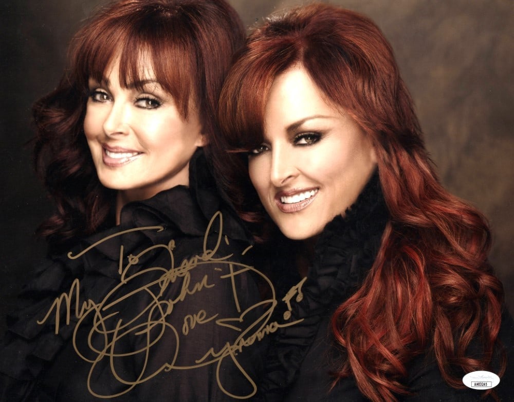 Wynonna Judd 11x14 Autographed Photo with JSA Authentication: Wynonna Judd 11x14 Autographed Photo with JSA Authentication This is an original 11x14 photograph autographed by legendary singer Wynonna Judd. The autograph has been authenticated by James Spence Aut