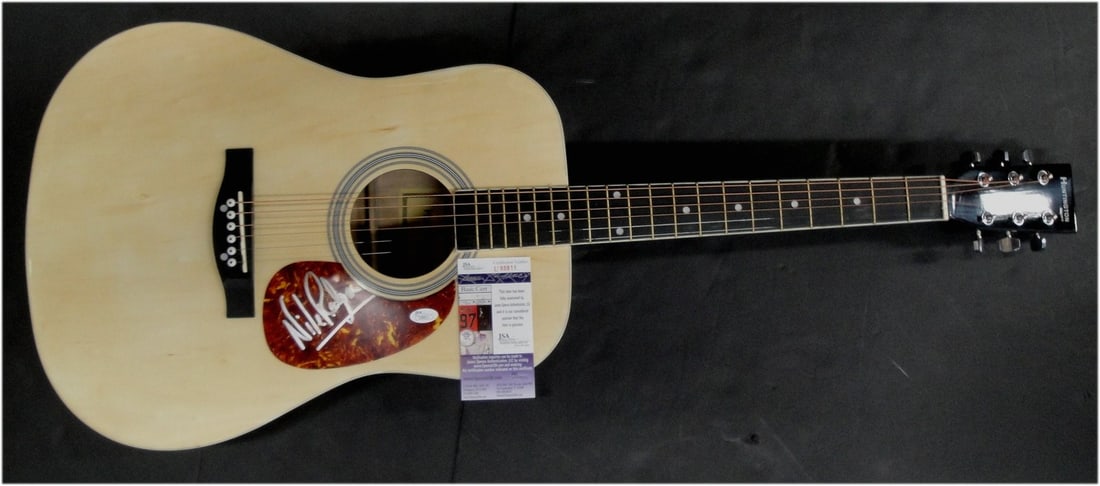 Nile Rodgers Autographed Acoustic Guitar Certified by JSA: Nile Rodgers Autographed Acoustic Guitar Certified by JSA This is an original acoustic guitar autographed by Nile Rodgers, a legendary musician known for his influential work in the music industry. Th