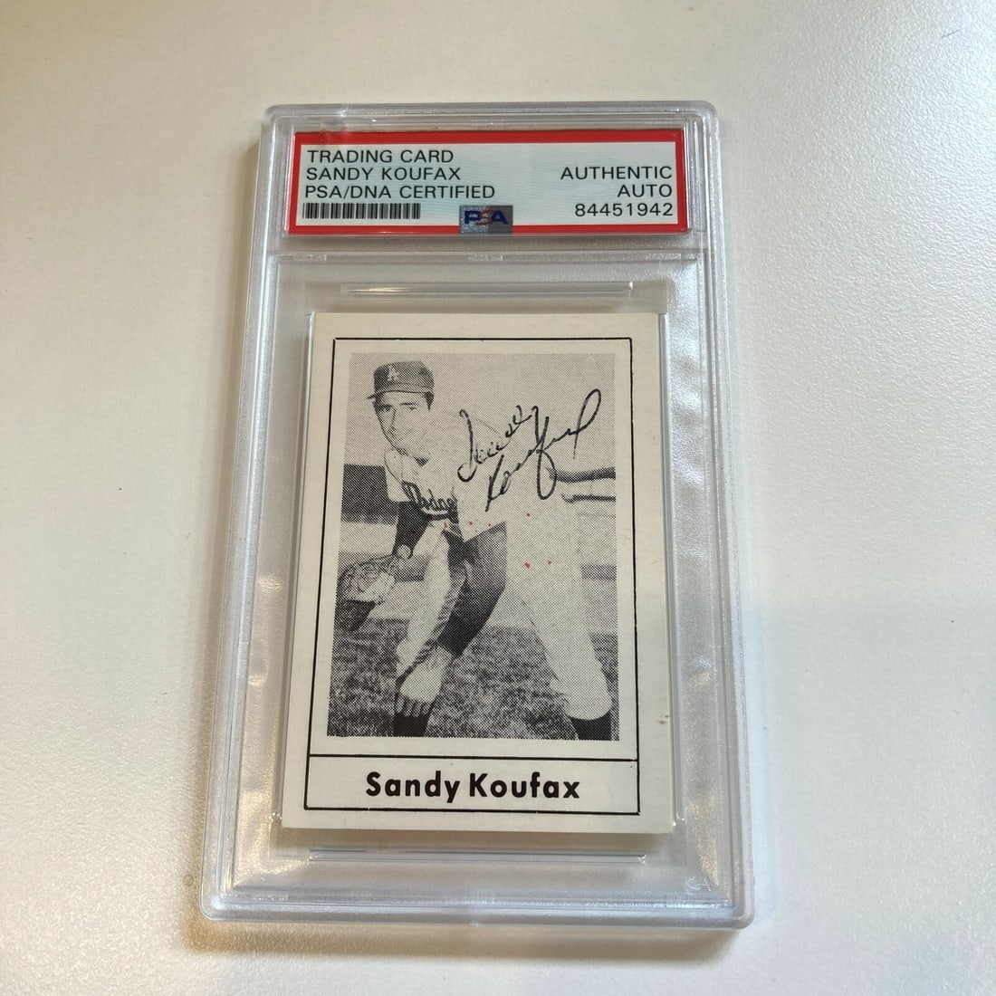 Sandy Koufax PSA Authenticated 1978 Grand Slam Signed Baseball Card: Sandy Koufax PSA Authenticated 1978 Grand Slam Signed Baseball Card This collectible features a Sandy Koufax autographed 1978 Grand Slam Baseball Card, a must-have for any baseball enthusiast. The car