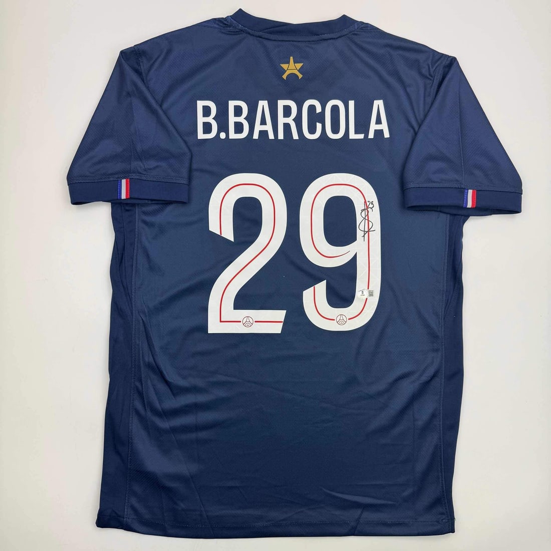 Bradley Barcola Signed PSG Blue Jersey BAS COA Authentic: Bradley Barcola Signed PSG Blue Jersey BAS COA Authentic Own a piece of sports memorabilia with this authentic, autographed blue jersey from Bradley Barcola, a rising star of Paris Saint-Germain. The 