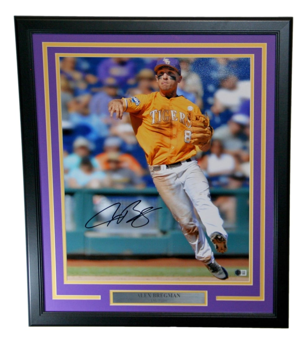 Alex Bregman Signed 16x20 LSU Tigers Photo Framed Beckett BAS: Alex Bregman Signed 16x20 LSU Tigers Photo Framed Beckett BAS Celebrate the incredible career of Alex Bregman with this stunning autographed 16x20 photo of him representing the LSU Tigers. This origin
