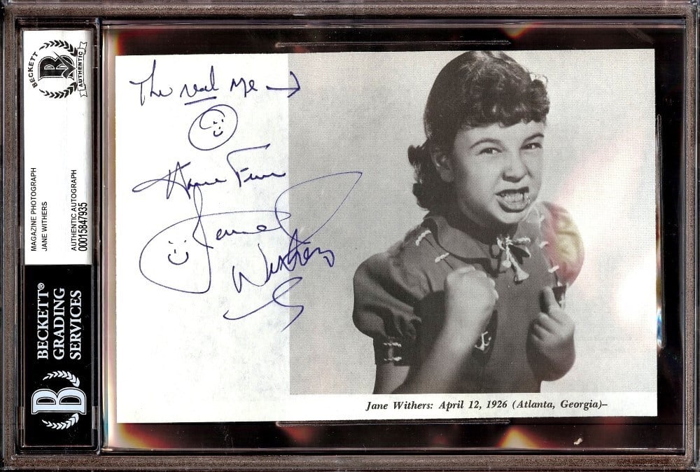 Jane Withers Beckett Authenticated Signed Magazine Photograph from Bright Eyes: Jane Withers Beckett Authenticated Signed Magazine Photograph from Bright Eyes This is an original photograph featuring Jane Withers, signed by the actress herself. The autographed magazine photo is a
