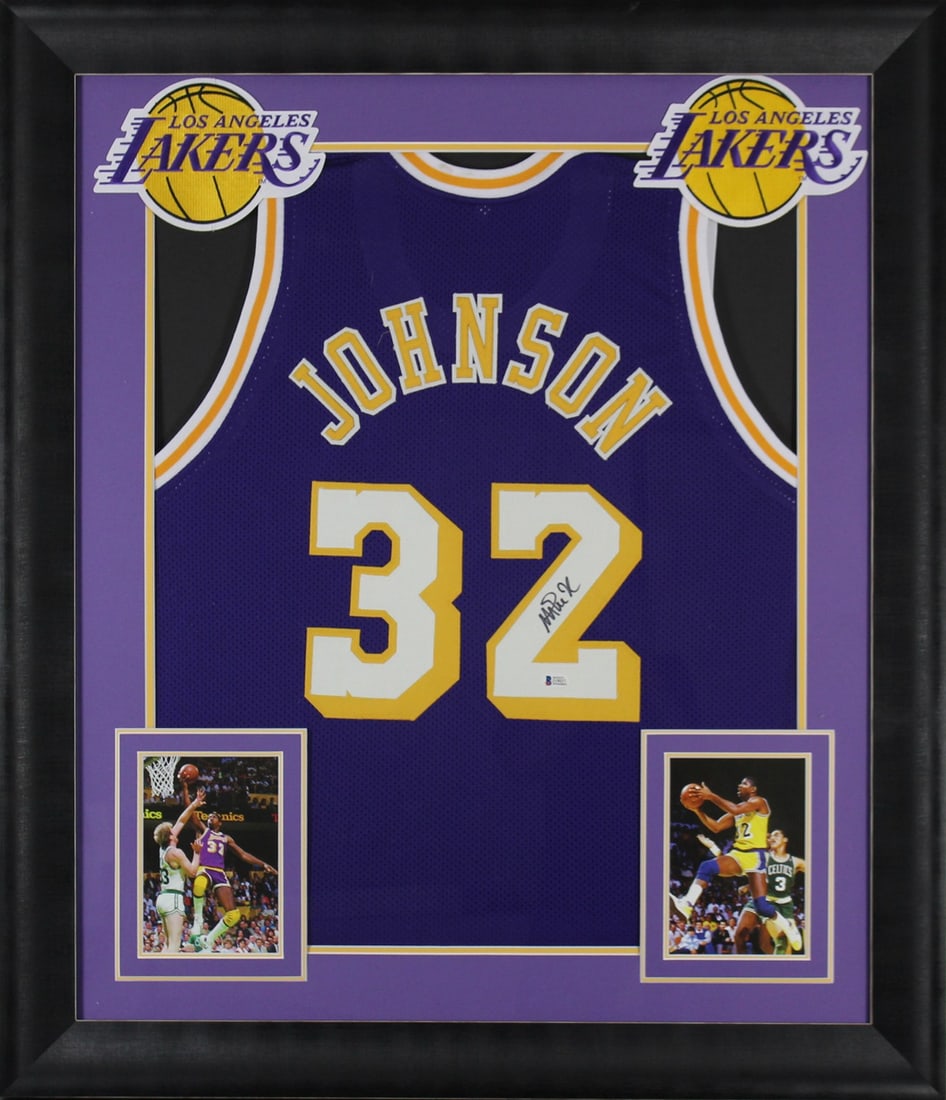 Framed Los Angeles Lakers Jersey Signed by Magic Johnson BAS Authenticated: Framed Los Angeles Lakers Jersey Signed by Magic Johnson BAS Authenticated This is an original, custom-stitched purple pro style jersey that has been personally signed by Magic Johnson of the Los Ange