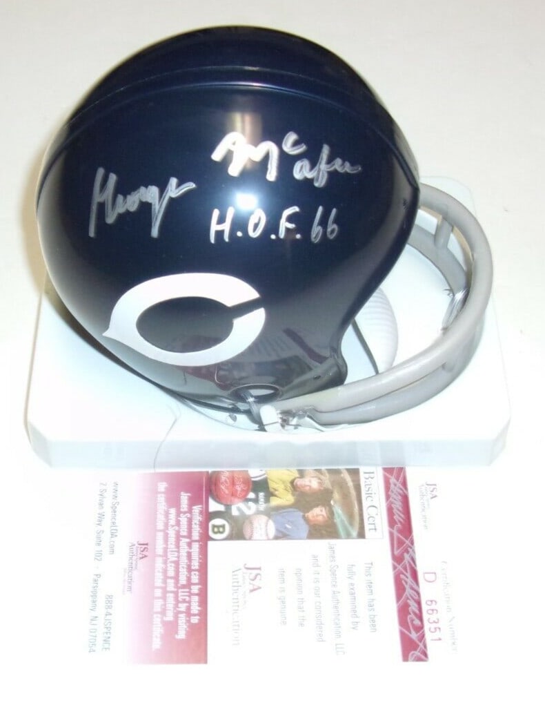 George McAfee signed Chicago Bears mini helmet JSA COA HOF 66: George McAfee signed Chicago Bears mini helmet JSA COA HOF 66 This is a pre-owned mini helmet signed by George McAfee, a Hall of Fame inductee in 1966, from the Chicago Bears. The helmet is an origina
