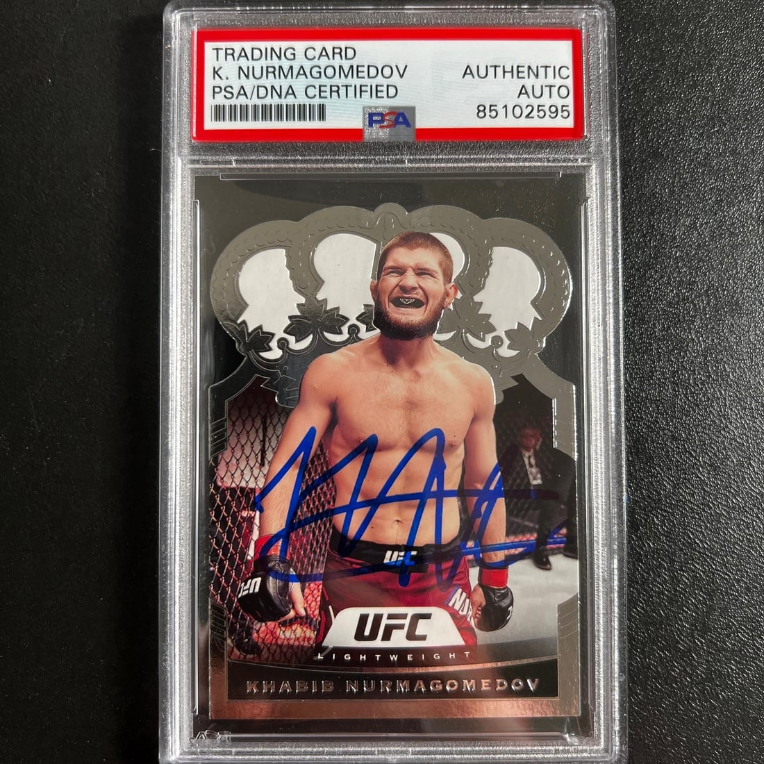 PSA Authenticated Khabib Nurmagomedov Crown Royale 2021 Panini #16 Card: PSA Authenticated Khabib Nurmagomedov Crown Royale 2021 Panini #16 Card This is a 2021 Panini Chronicles Crown Royale #16 sports trading card featuring Khabib Nurmagomedov. The card is autographed by 