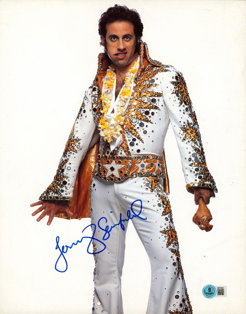 Jerry Seinfeld Signed 11x14 Elvis Photo with Beckett Authentication: Jerry Seinfeld Signed 11x14 Elvis Photo with Beckett Authentication This striking 11x14 vertical photograph of Elvis has been personally signed by comedian Jerry Seinfeld. The item is certified authen