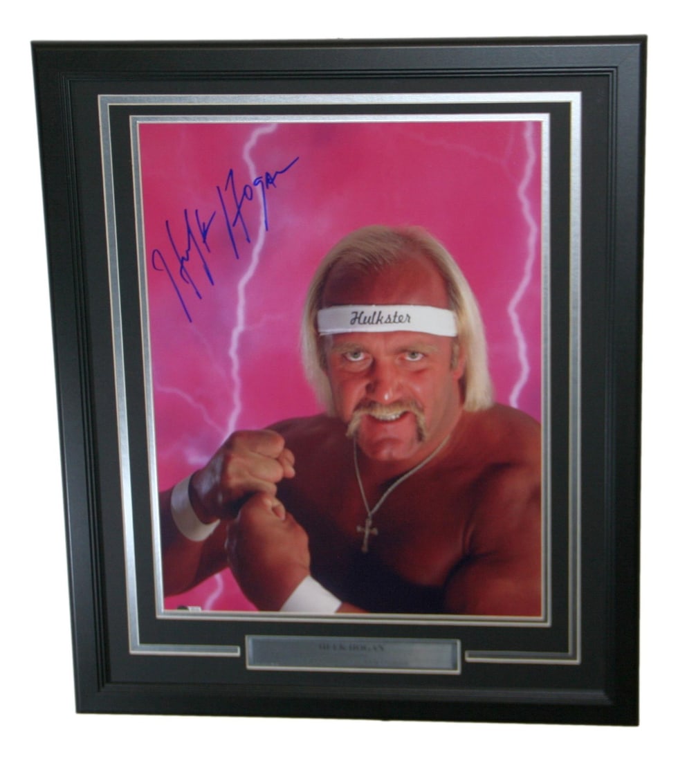 Framed 16x20 Wrestling Photo Signed by Hulk Hogan Beckett Authenticated: Framed 16x20 Wrestling Photo Signed by Hulk Hogan Beckett Authenticated This is a framed 16x20 photo autographed by Hulk Hogan, a legendary figure in WWE wrestling. The autograph on this original phot