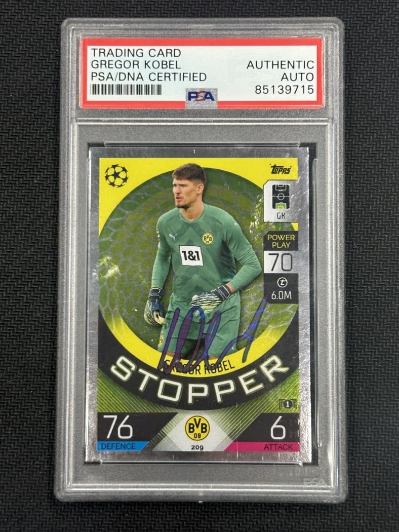 Gregor Kobel 2021 Topps Match Attax Hand Signed PSA Authentic Soccer Card: Gregor Kobel 2021 Topps Match Attax Hand Signed PSA Authentic Soccer Card Celebrate your passion for soccer with this hand-signed Gregor Kobel 2021 Topps Match Attax card. This collectible features Gr
