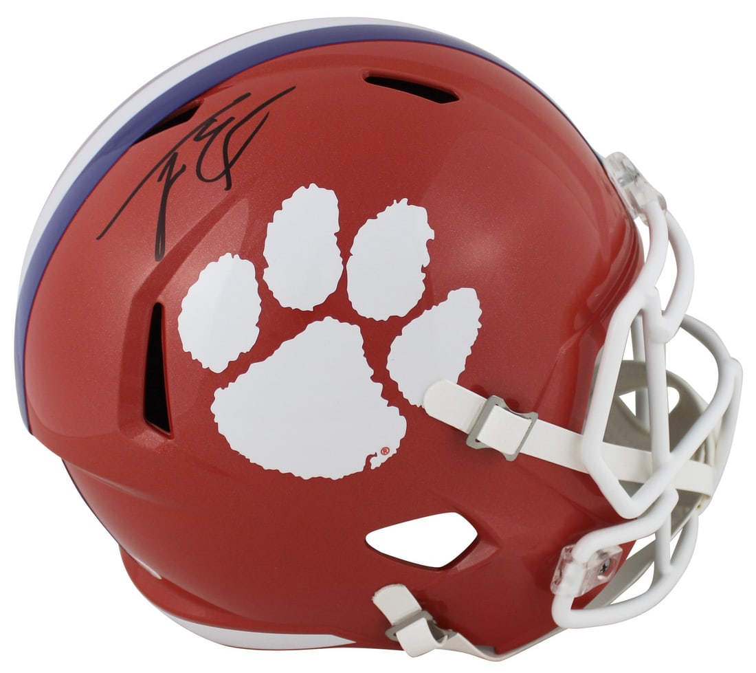 Clemson Tigers Travis Etienne Jr. Autographed Full Size Speed Helmet JSA COA: Clemson Tigers Travis Etienne Jr. Autographed Full Size Speed Helmet JSA COA This is an original autographed full-size Speed replica helmet personally signed by Travis Etienne Jr. of the Clemson Tiger