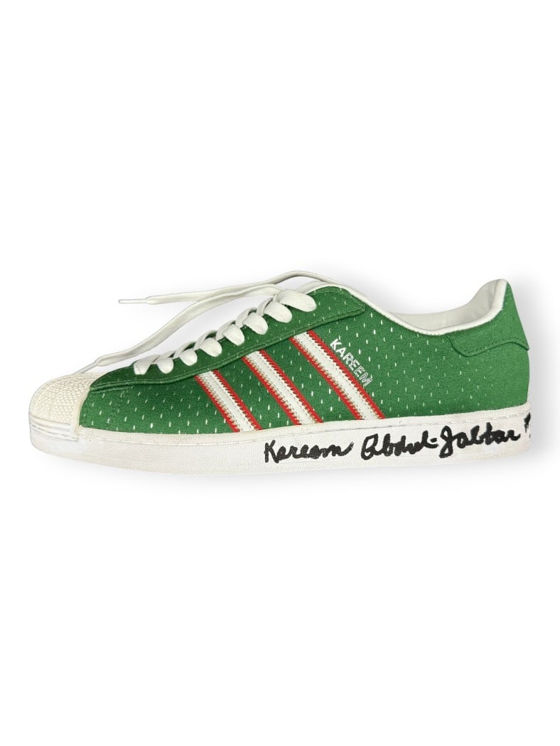 Kareem Abdul-Jabbar Signed Adidas Size 16 Lakers Shoe PSA Authenticated 1 of 1: Kareem Abdul-Jabbar Signed Adidas Size 16 Lakers Shoe PSA Authenticated 1 of 1 This is a custom Adidas shoe, size 16, autographed by Kareem Abdul-Jabbar. The shoe features his inscription of #33 and i