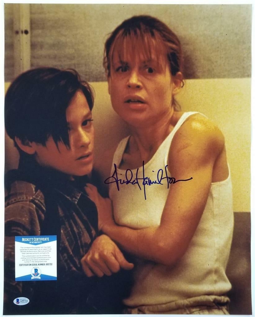 16x20 Terminator Photo Hand Signed by Linda Hamilton with Beckett BAS Authentication: 16x20 Terminator Photo Hand Signed by Linda Hamilton with Beckett BAS Authentication This is an original 16x20 photograph signed by Linda Hamilton from the Terminator franchise. The autograph is authe